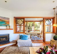 Treetops - elegant inviting designer cedar home - Suburb Australia