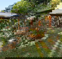Palm Grove Rainforest Retreat - Suburb Australia